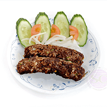 seekh-kebabs-in-with-cucumbers-and-tomatoes